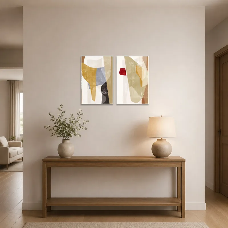 Entrance hall featuring modern abstract art set with earthy tones, welcoming guests warmly.