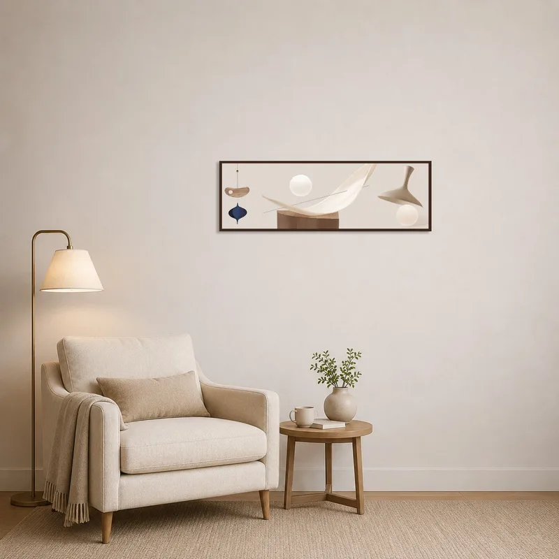 Reading corner with a cozy feel and a soft-toned abstract print.
