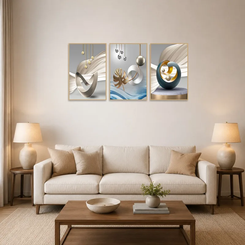 Triptych with abstract metallic designs hangs above a sleek living room sofa.