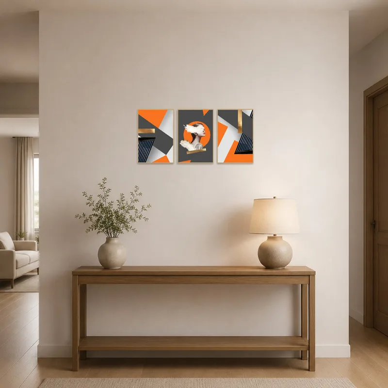 Entrance hall showcasing a striking triptych with modern abstract orange and gold hues.