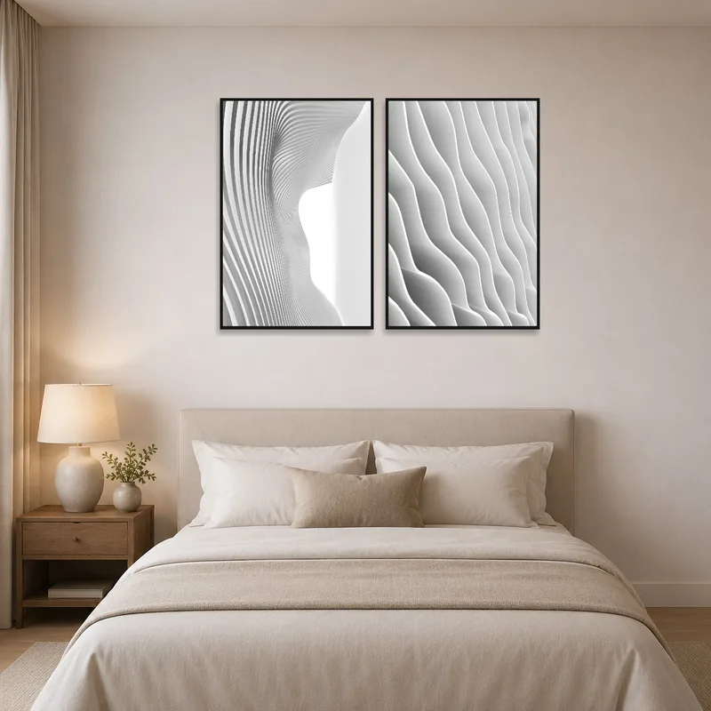Bedroom wall displays modern prints creating an abstract ambiance.