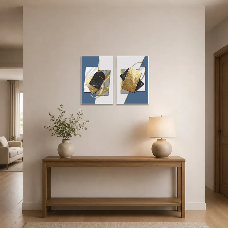 Blue and gold art set welcoming guests in a chic entrance hall.