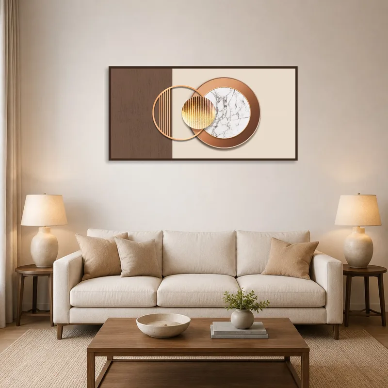 Artwork of geometric circles with marble design above a modern sofa.