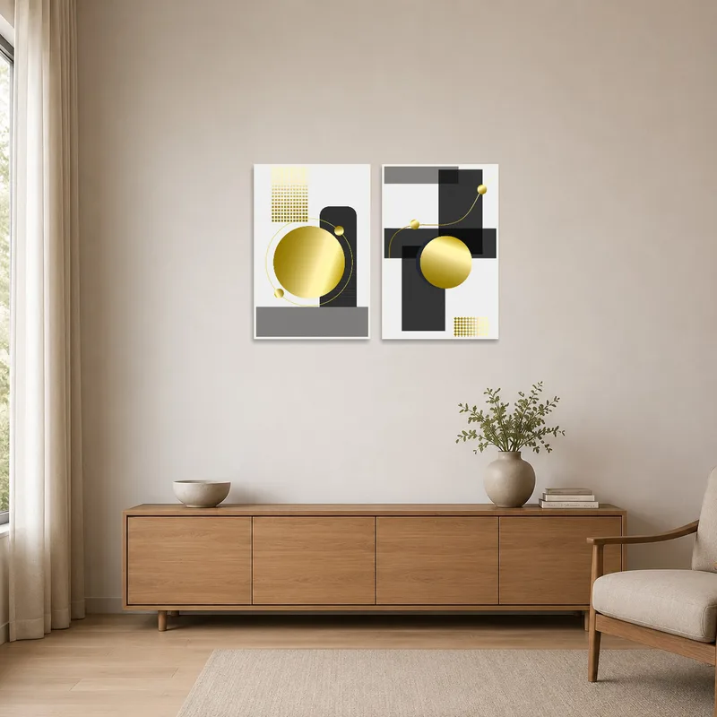 A minimalist room showcasing a gold and black geometric piece against a stark white wall.