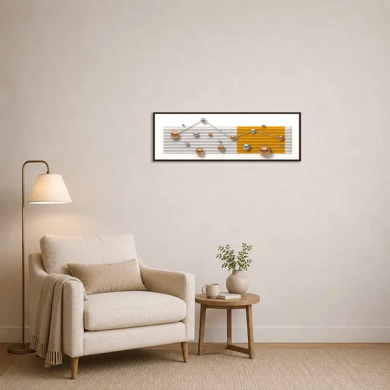 Geometric spheres art piece adding a modern touch to a cozy reading corner with an armchair.