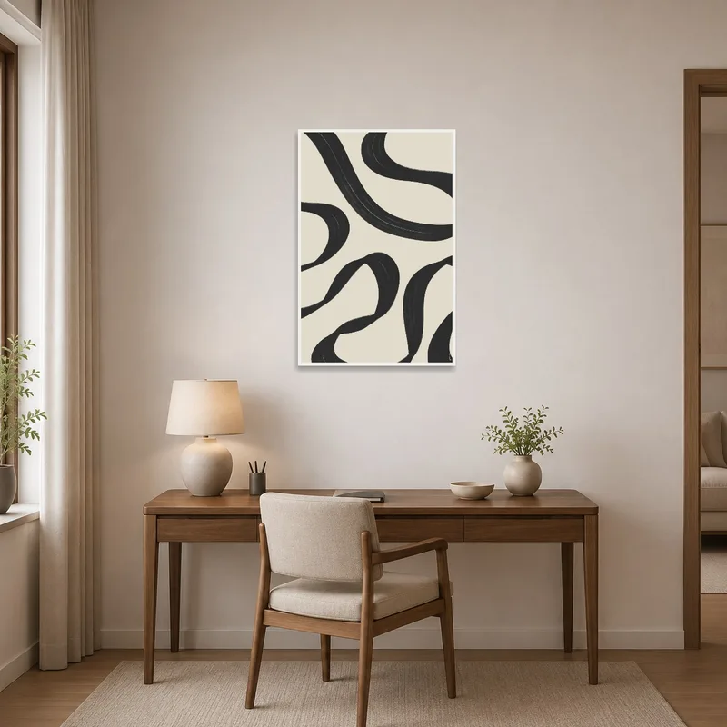 Black swirl print as a focal point in a sleek home office.