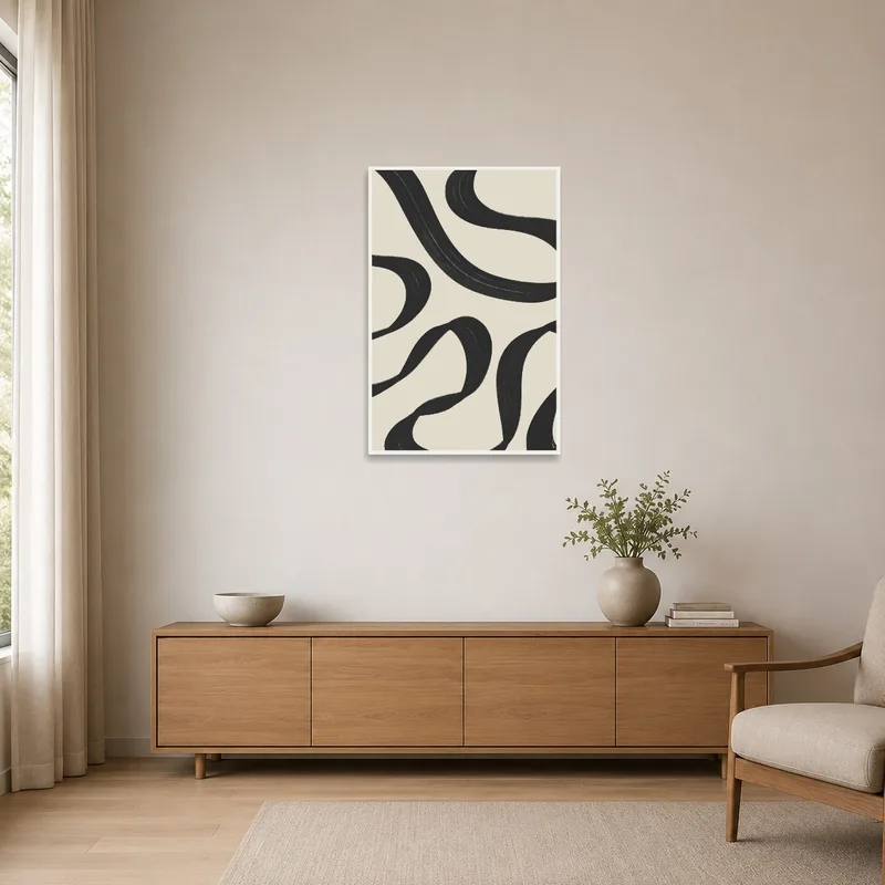 Monochrome swirl print enhancing a minimalist white wall.