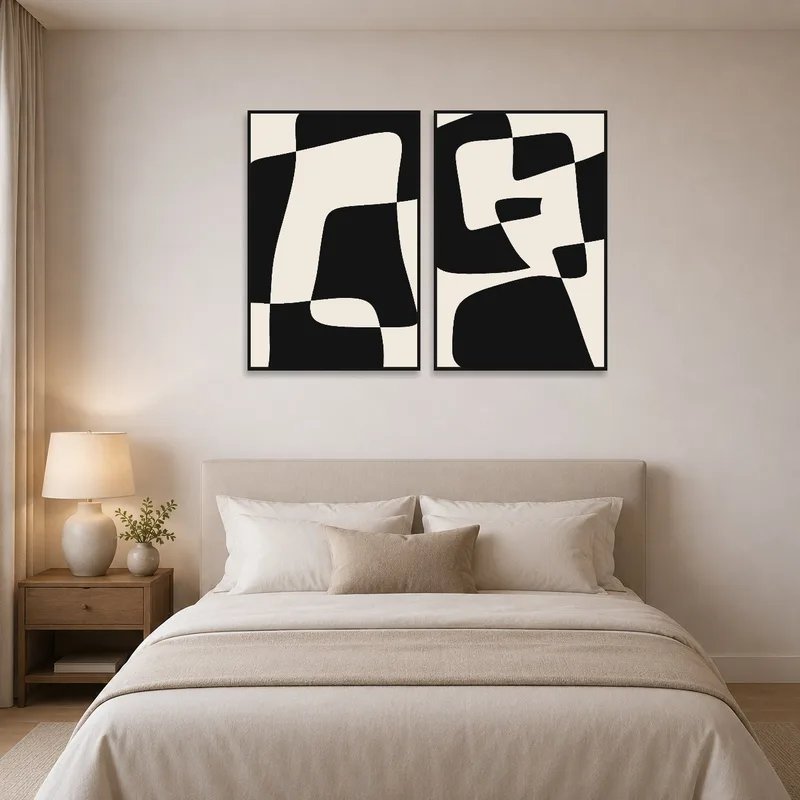 Geometric prints in black and white add elegance to a serene bedroom.