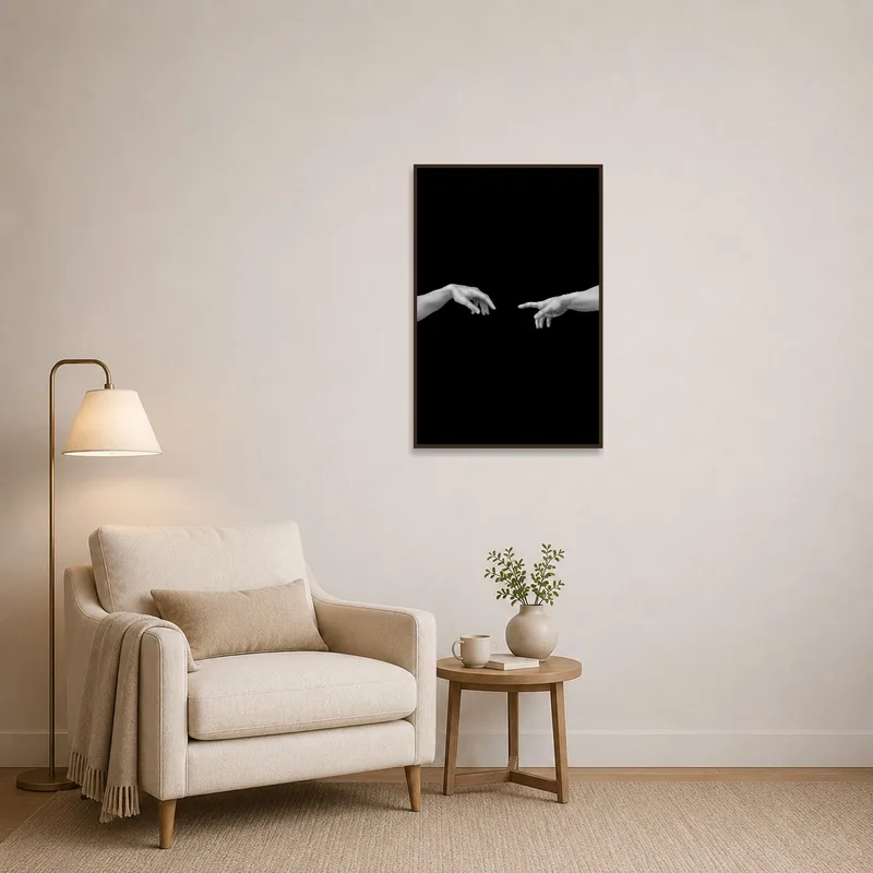 Reading corner adorned with a soothing monochrome hands on black art print.