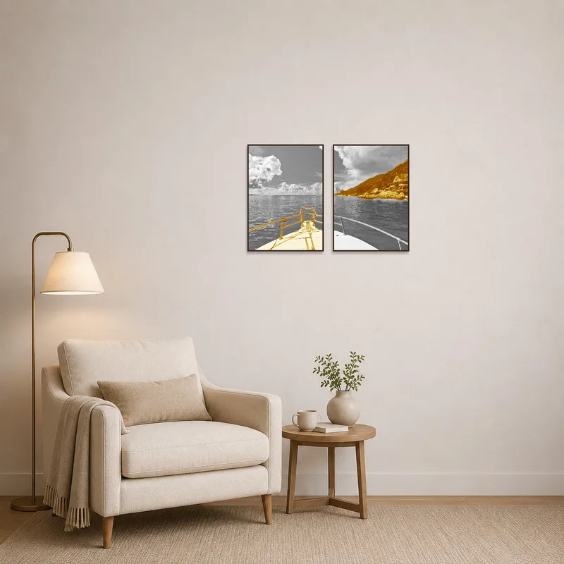 Sepia-toned coastal art creating a serene atmosphere beside an armchair surrounded by books.