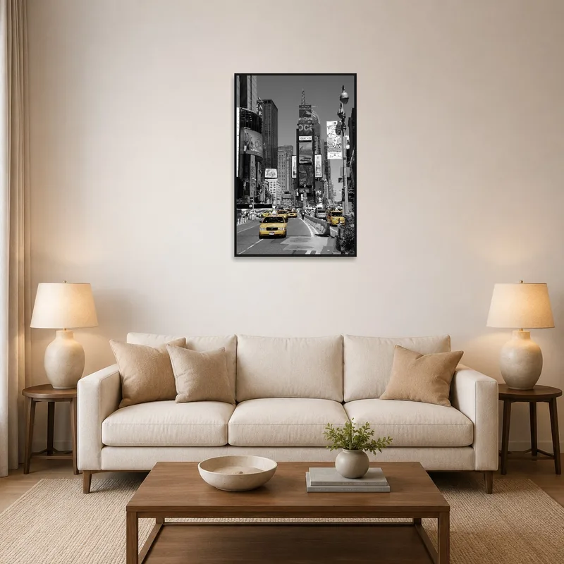 Urban art piece of NYC taxis above a beige sofa in a cozy living-room.