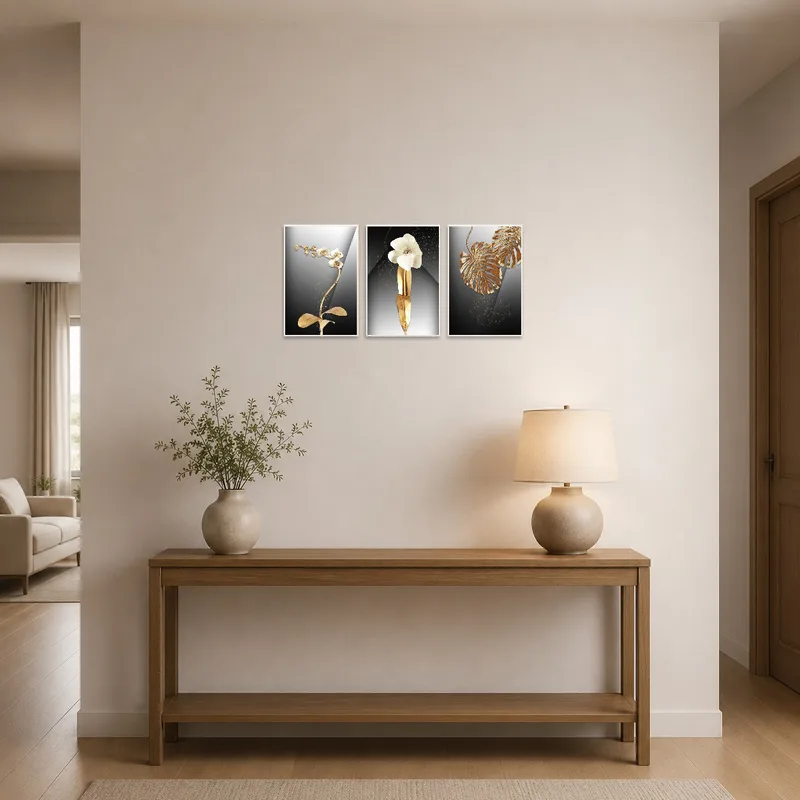 Botanical triptych of orchids and leaves welcoming guests in an entrance hall.