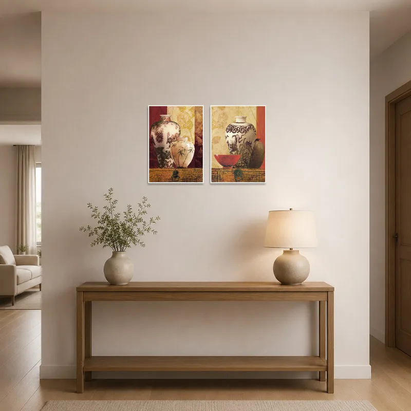 Entrance hall adorned with art featuring two elegant ceramic vessels.