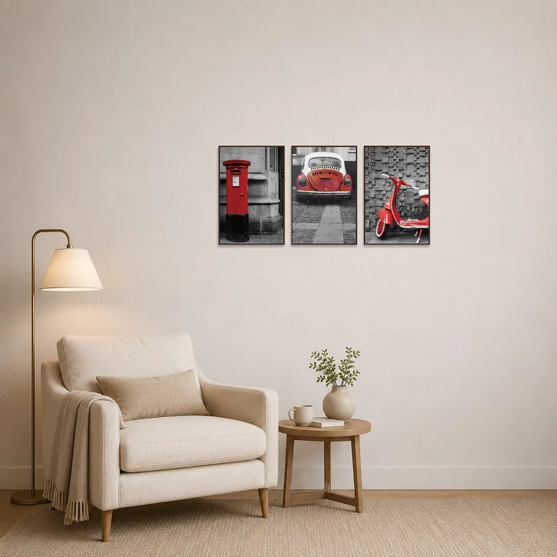 Cozy reading corner featuring a vibrant triptych of red vehicles.