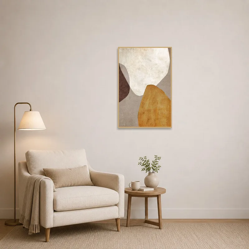 Cozy reading corner with a rustic abstract shapes art print on the wall.