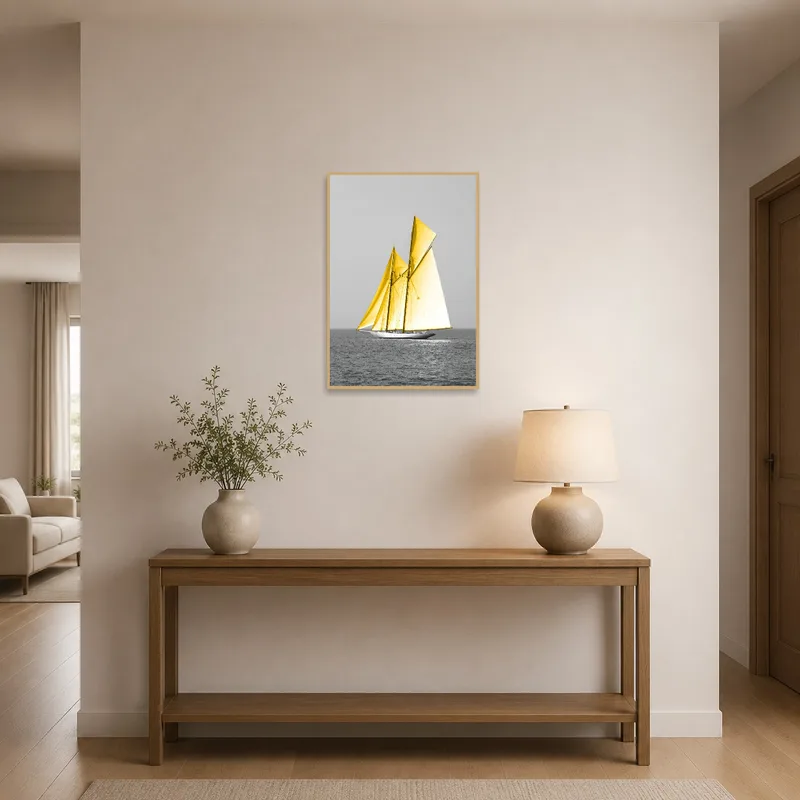 Sailboat in motion welcomes guests in a bright entrance hall with a wooden console table.