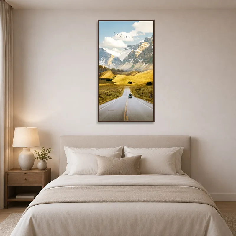 Bedroom wall adorned with a serene mountain drive scene featuring a vintage car.