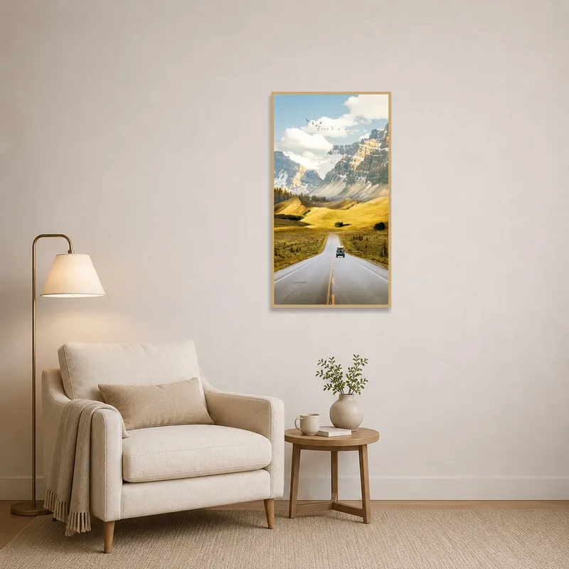 Reading nook features art of a vintage vehicle driving through mountains, evoking wanderlust.