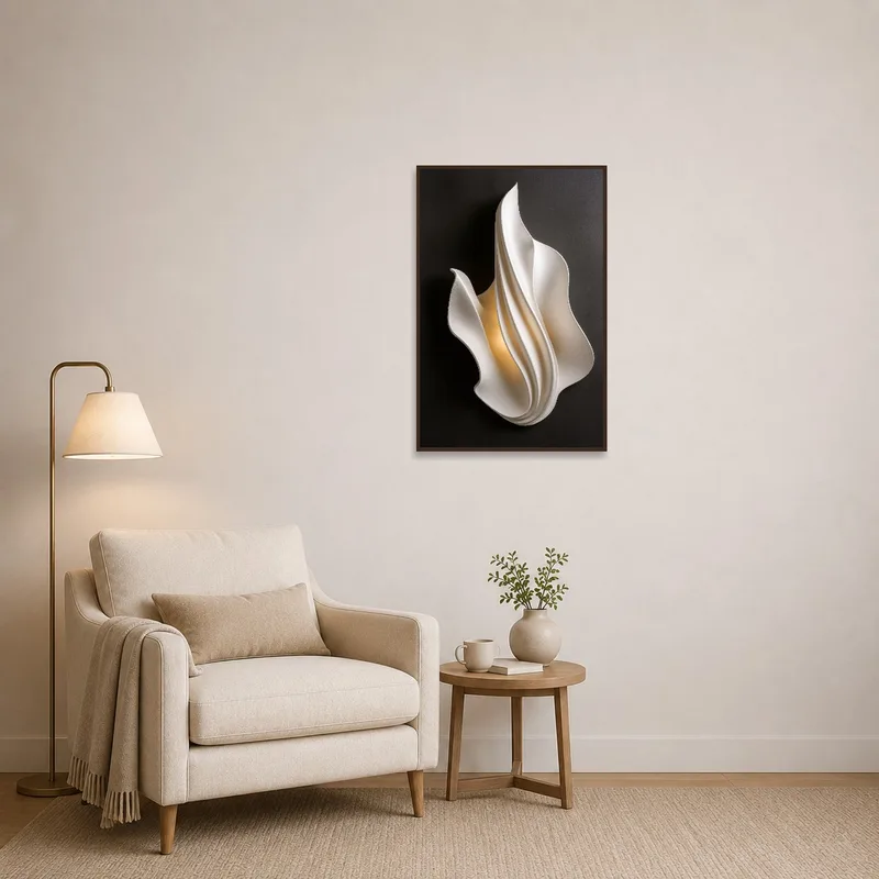 The art complements a plush chair and lamp in a reading corner.
