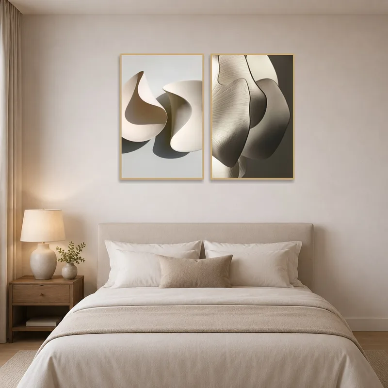 Abstract curves art set enhancing the tranquility of a bedroom.