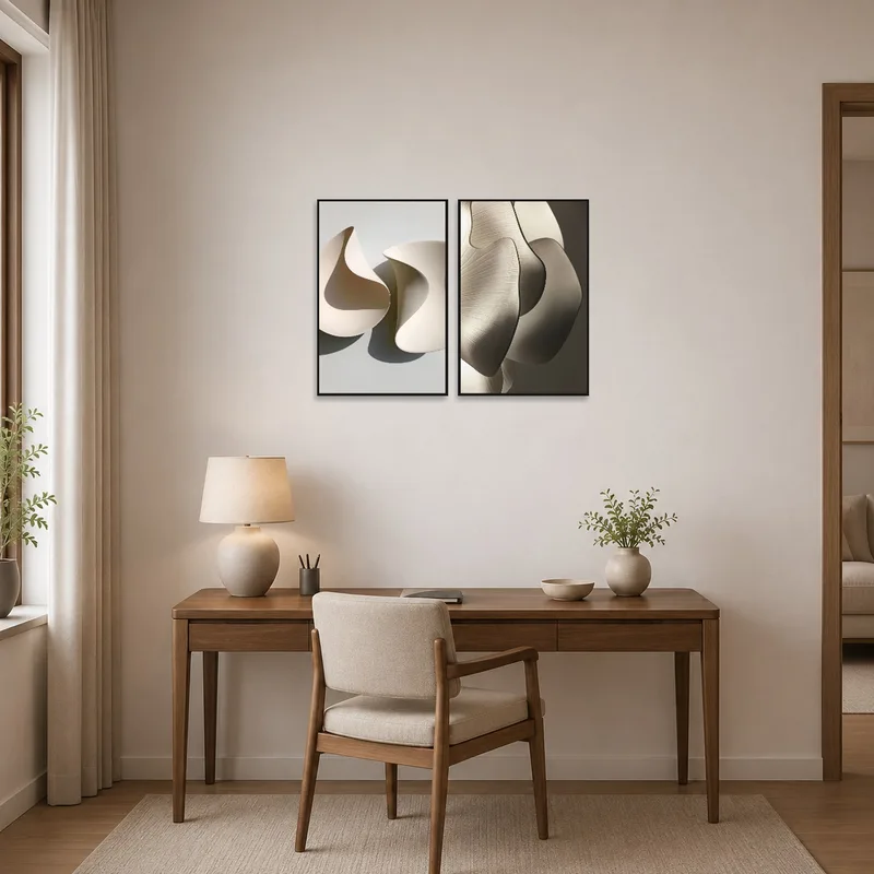 Home office accented with a serene art set of abstract curves.