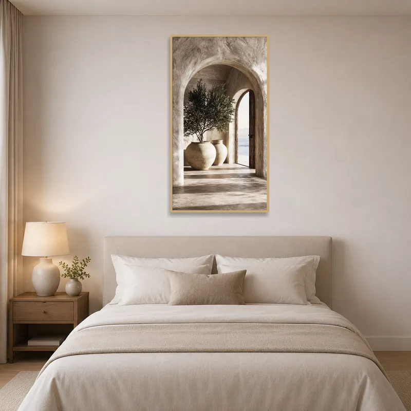 Calm bedroom ambiance enhanced by the archway and trees print.
