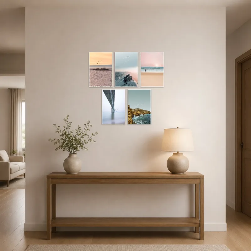Entrance hall featuring serene coastal and mountain landscape set.