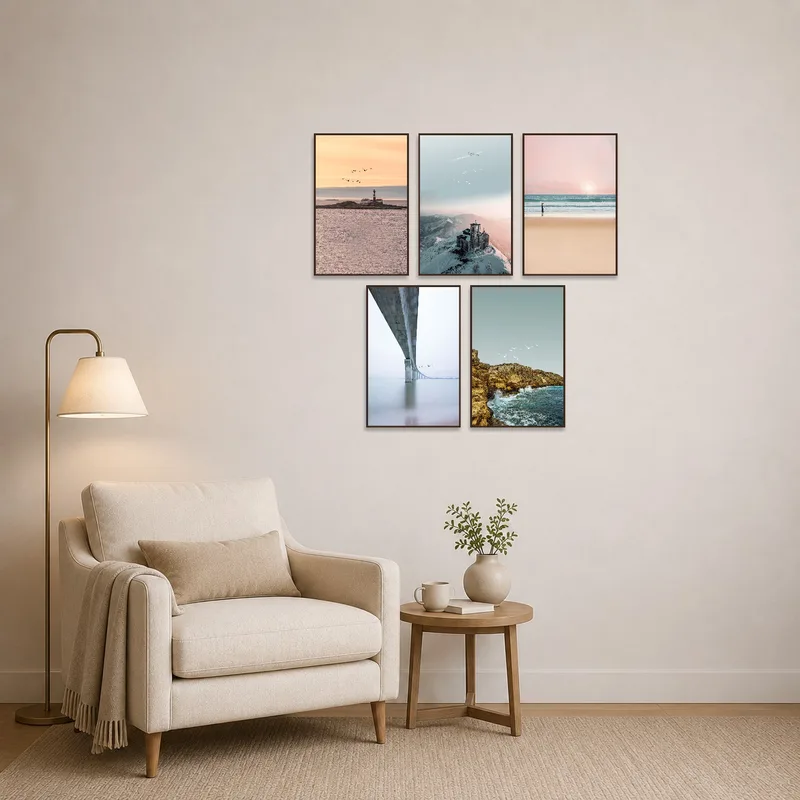 Reading corner adorned with serene coastal and mountain scenes.