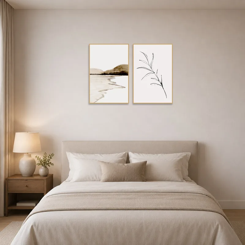 Bedroom ambiance enriched by peaceful botanical and landscape art above the headboard.