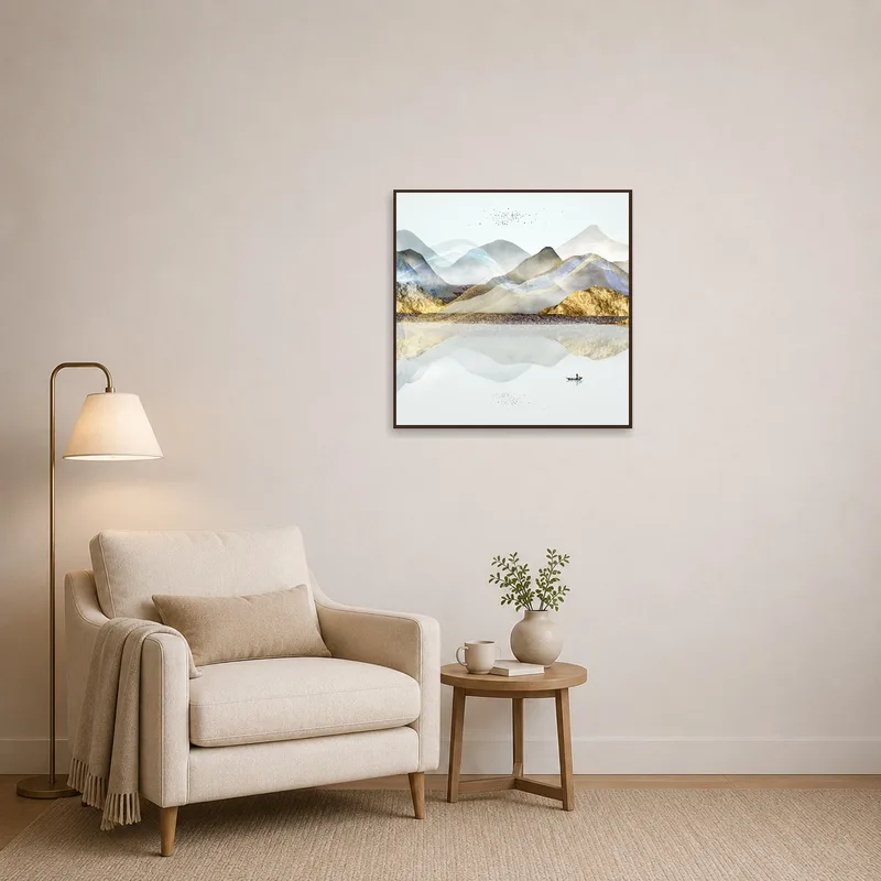 Calming mountain landscape art beside a comfortable reading chair.