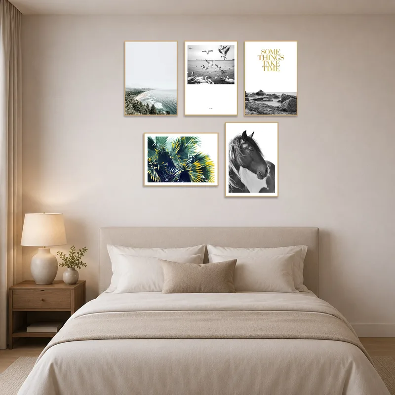 Nature photos introduce a sense of calm and wilderness to the bedroom.