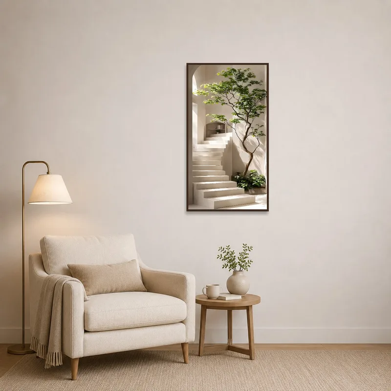 Reading corner enhanced by a serene staircase art print with greenery.