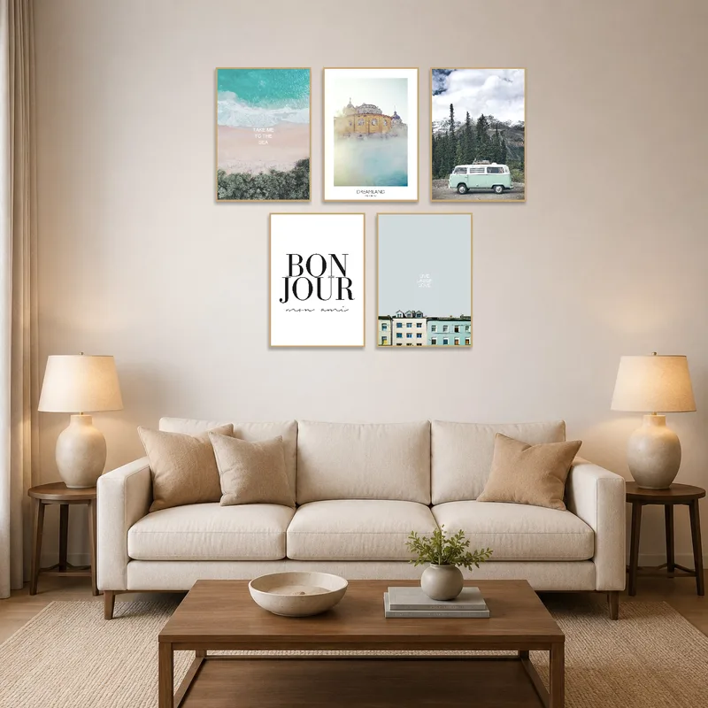 Art set displayed on a living room wall above a cozy couch.