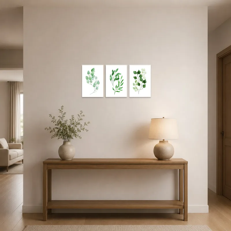 Lush greenery triptych welcomes guests in the entrance hall.