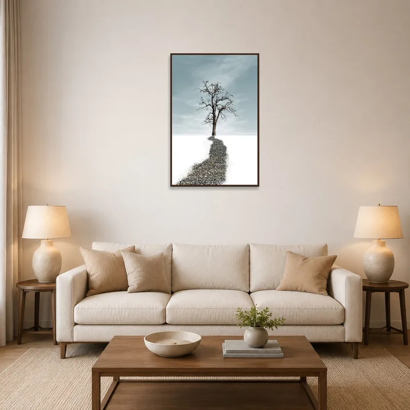 Solitary tree artwork hanging above a modern sofa in a cozy living room.
