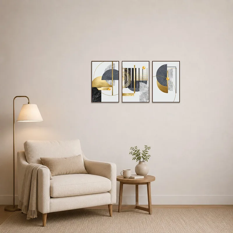 Reading corner adorned with a geometric triptych art set, complementing a cozy armchair.
