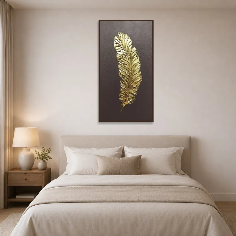 Elegant gold leaf canvas art brings warmth to the bedroom wall.