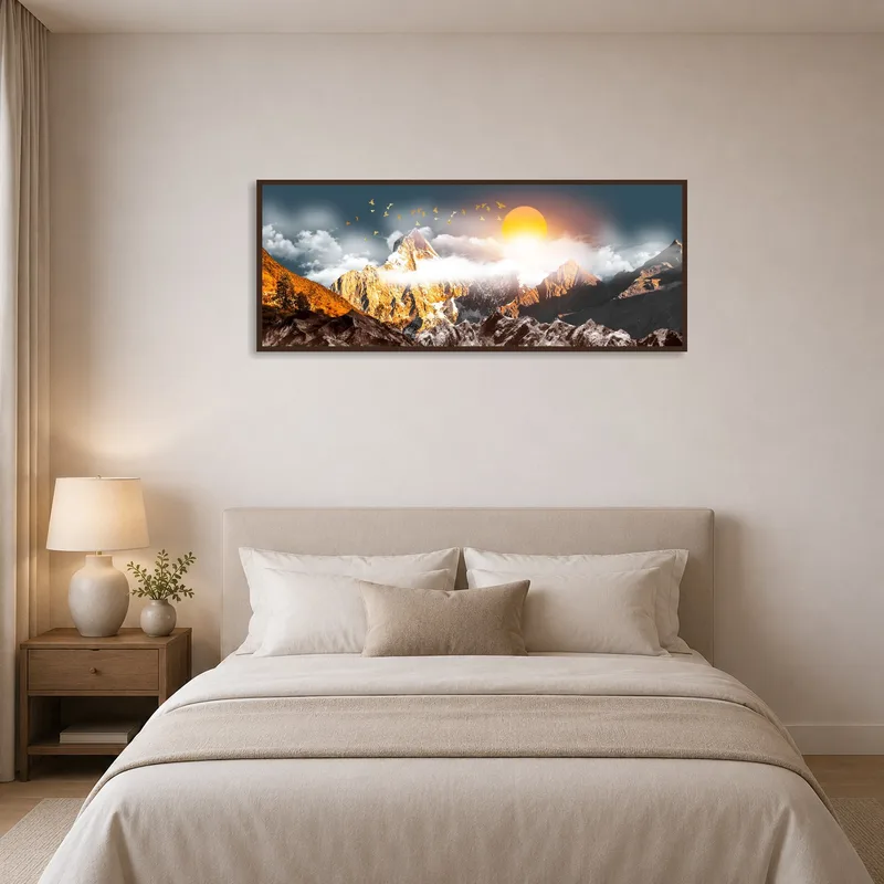 Sunlit mountainscape artwork adding tranquility to a serene bedroom.