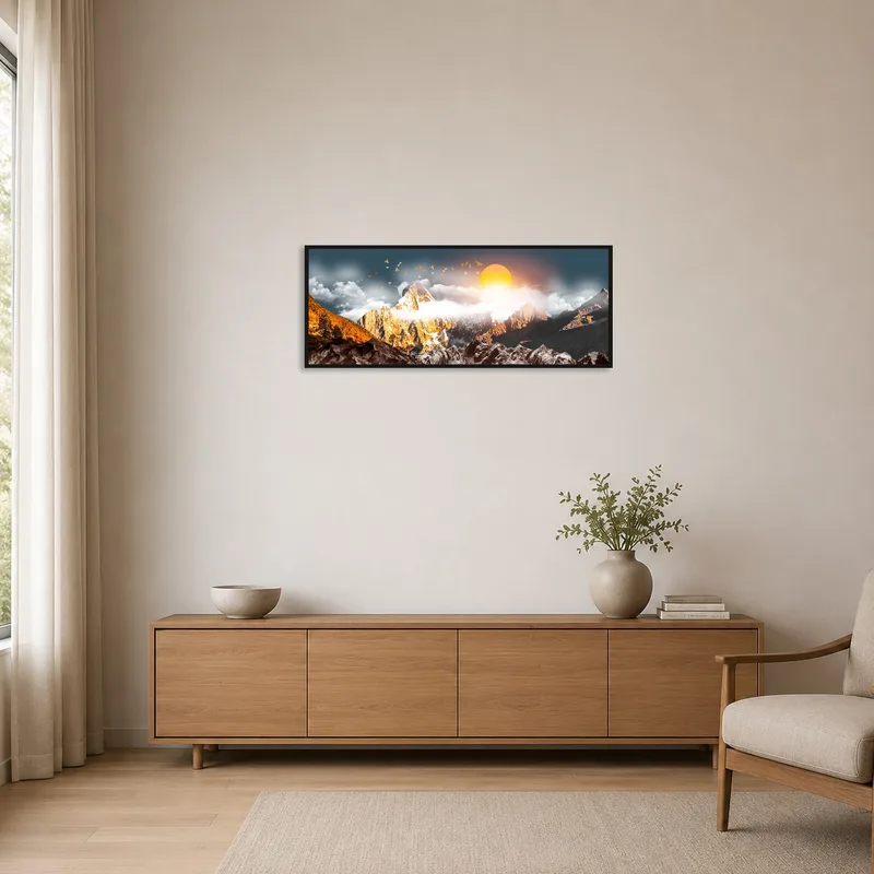 Sunlit mountainscape artwork on a clean white wall in a minimalist space.