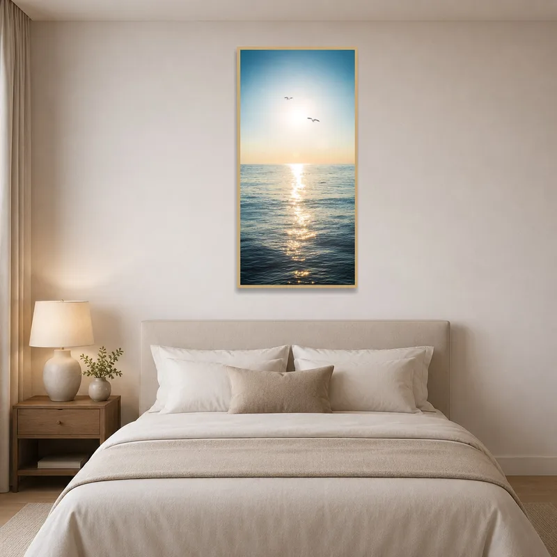A tranquil ocean horizon and seagulls on a bedroom wall, enhancing relaxation near the bed.