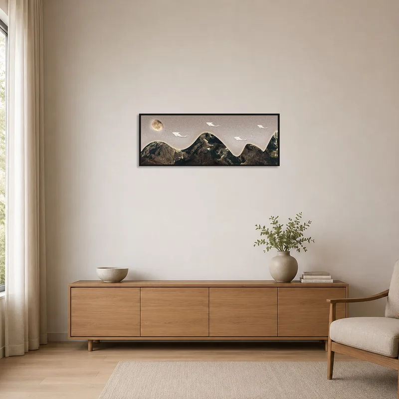 Surreal mountain print on a white wall in a minimalist space.