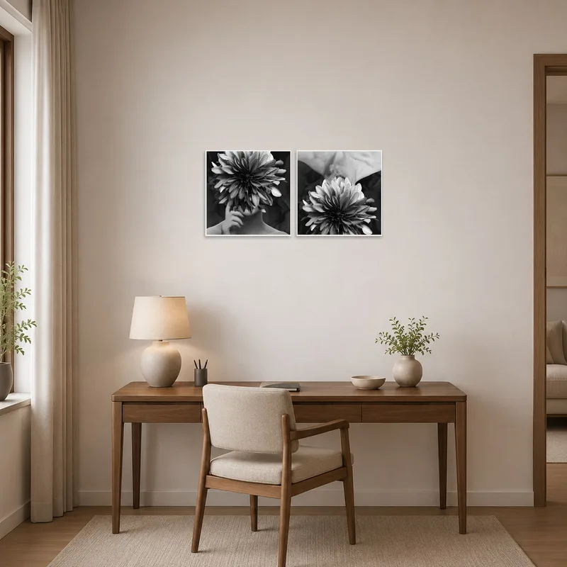 Home office wall adorned with a surreal floral monochrome art set for inspiration.