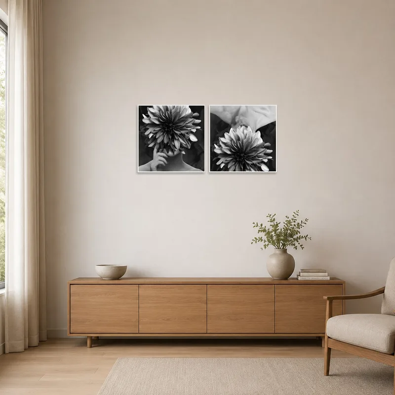 Minimalist room featuring a surreal floral monochrome art set on a blank wall.