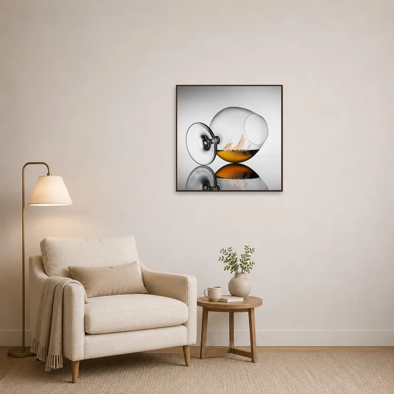 Surreal Sailing in a Glass print beside a cozy chair in the reading corner.