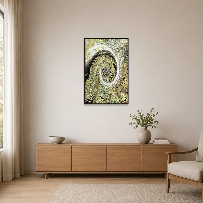 Minimalist room with swirling gold and earth tones abstract art against a plain, neutral wall.