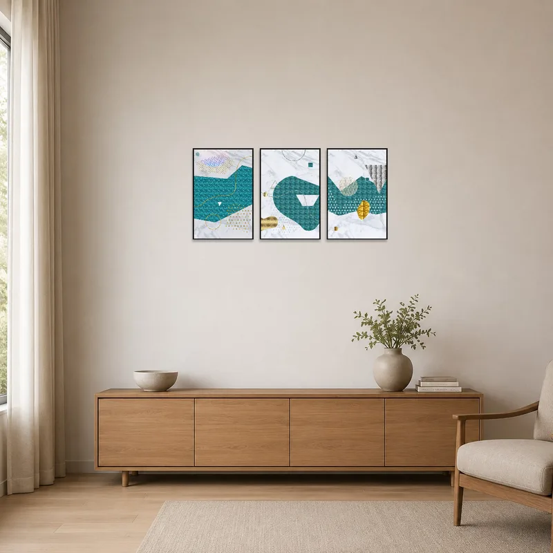 Triptych art set of teal and gold adds charm to a minimalist room.