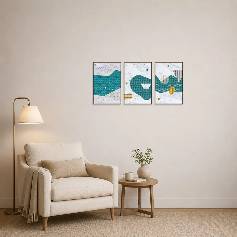 Triptych art set in teal and gold brings focus to a cozy reading corner.