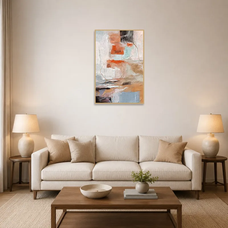 Textured abstract art with earthy tones on a living room wall, complementing warm furniture and plants.
