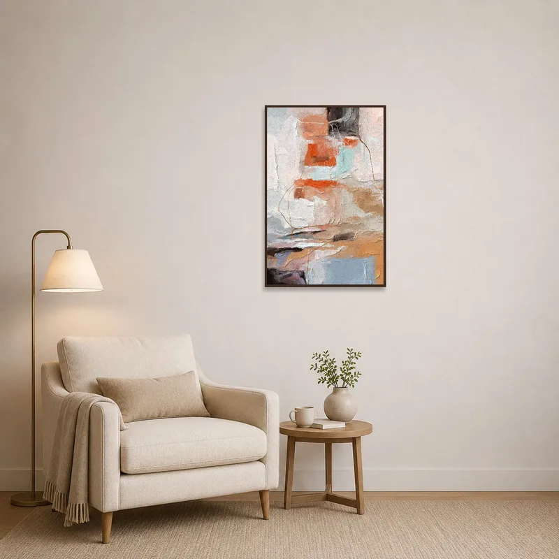 Cozy reading corner featuring textured abstract art in earthy hues, creating a serene atmosphere.