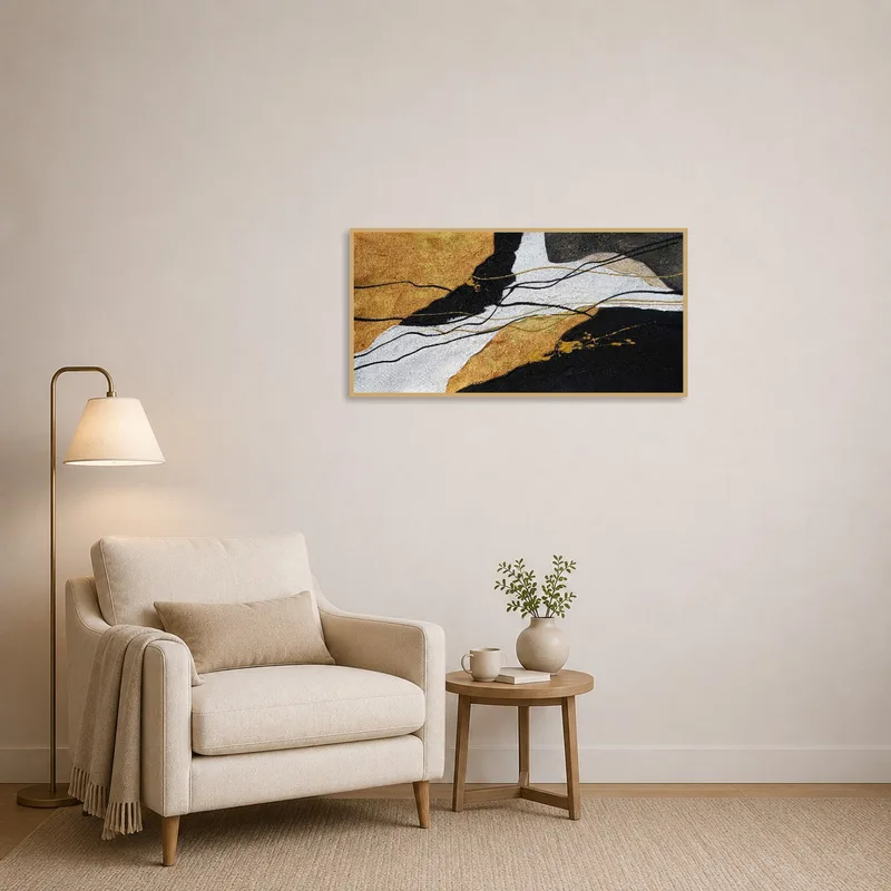 Artistic piece with gold touches enhancing a serene reading corner.